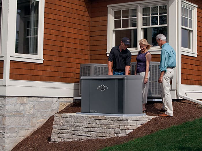 Generator being installed for couple ouside of home